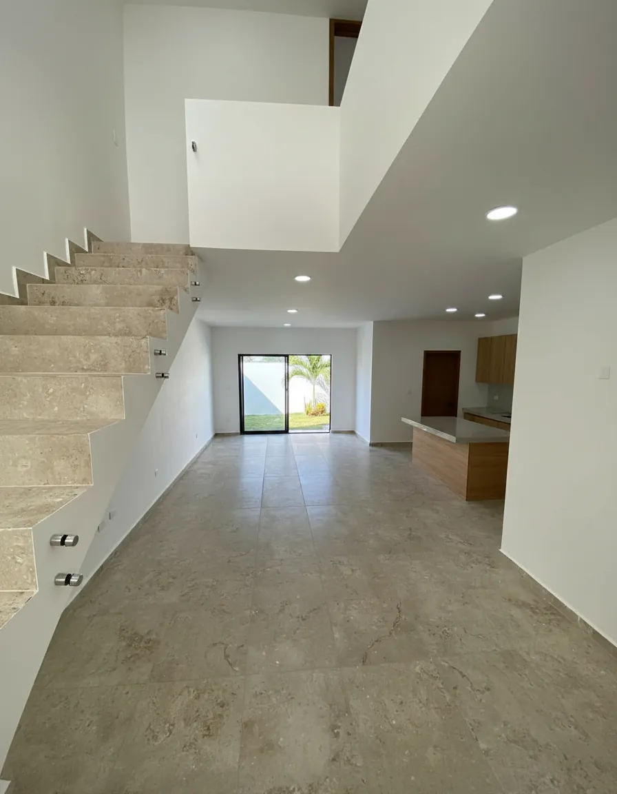 Sala-comedor hacia el jardín de la Casa Prados en Real Campestre, Villahermosa